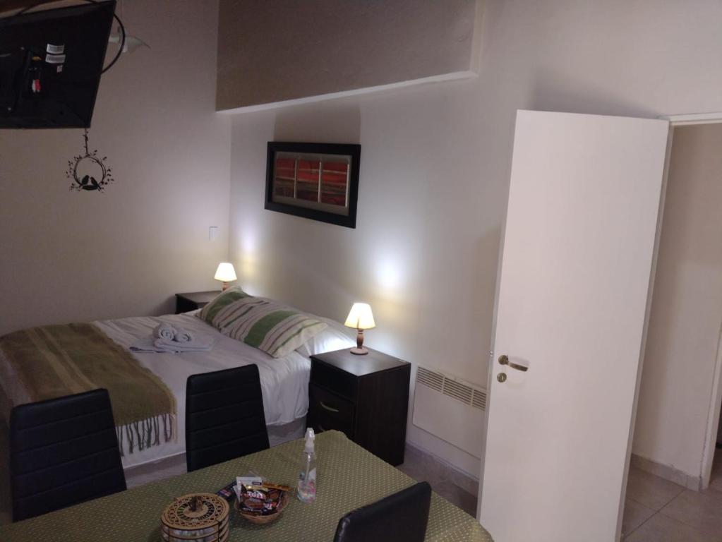 Postel nebo postele na pokoji v ubytování Chacras de Coria Centro Apart