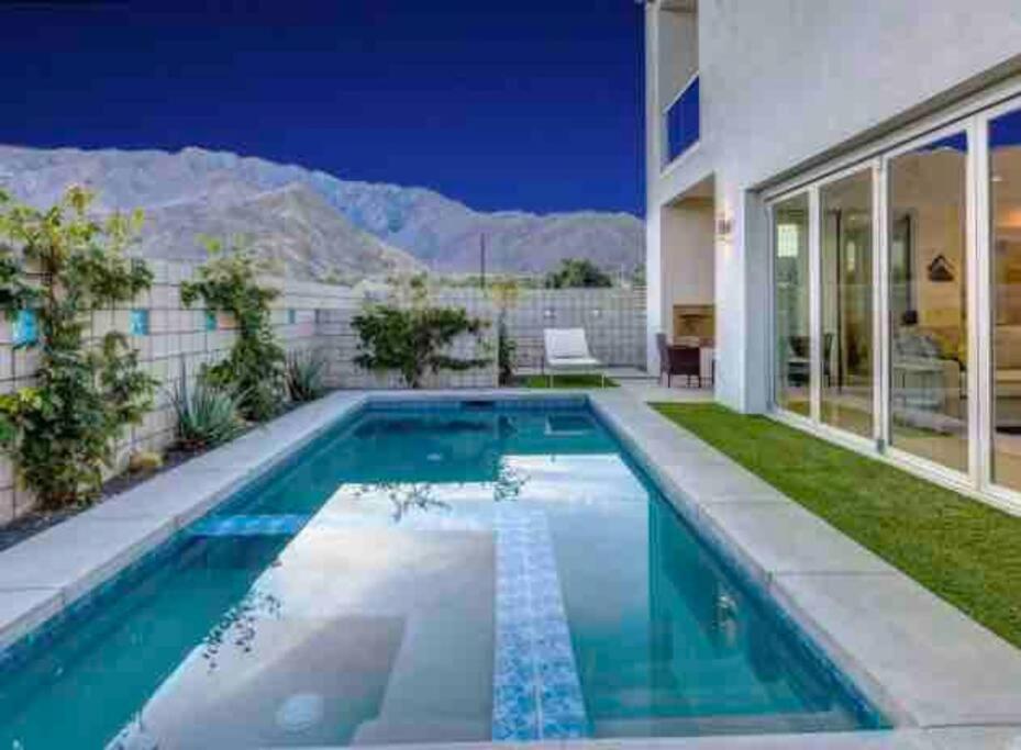 a swimming pool in the backyard of a house at Gateway Luxury Resort Style With A Private Pool in Palm Springs