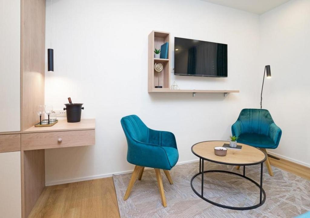 TV a/nebo společenská místnost v ubytování Luxury rooms MARIOTY