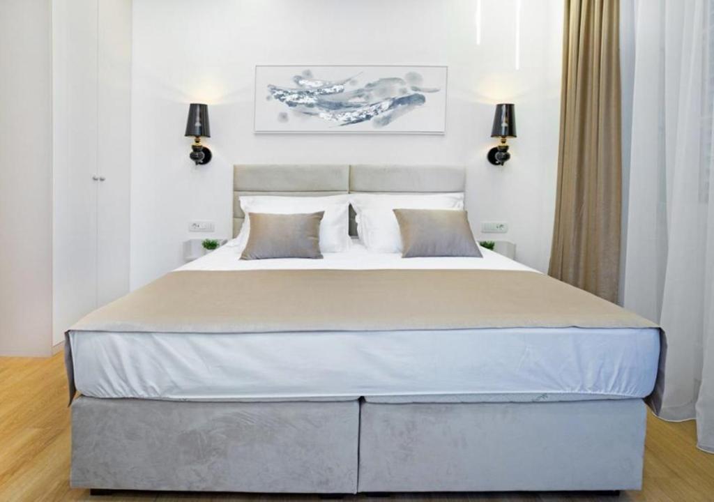 Postel nebo postele na pokoji v ubytování Luxury rooms MARIOTY