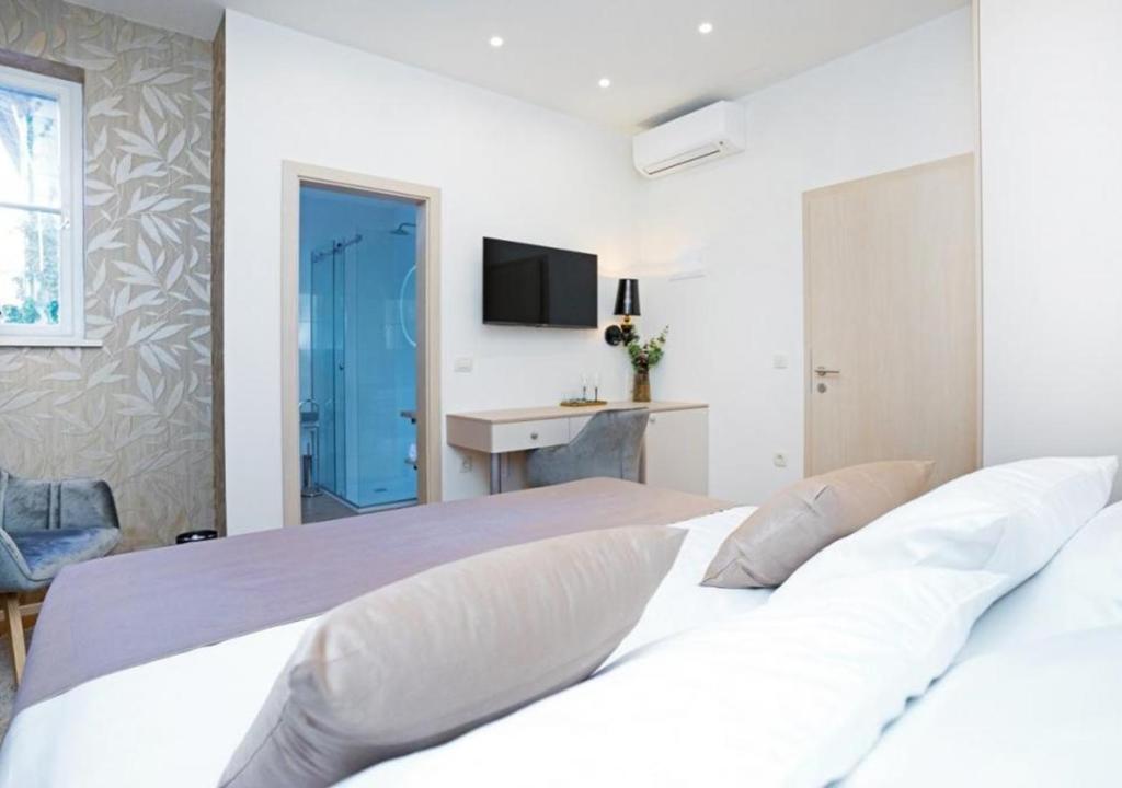 Postel nebo postele na pokoji v ubytování Luxury rooms MARIOTY