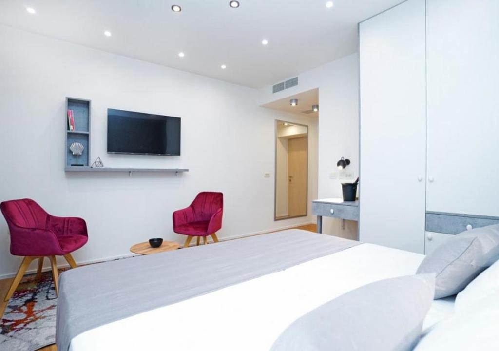 TV a/nebo společenská místnost v ubytování Luxury rooms MARIOTY