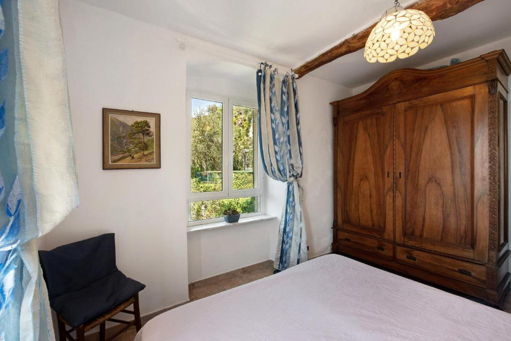 Postel nebo postele na pokoji v ubytování Cottage con vista mare