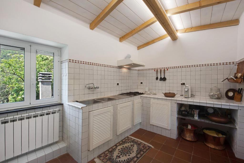 Kuchyň nebo kuchyňský kout v ubytování Cottage con vista mare
