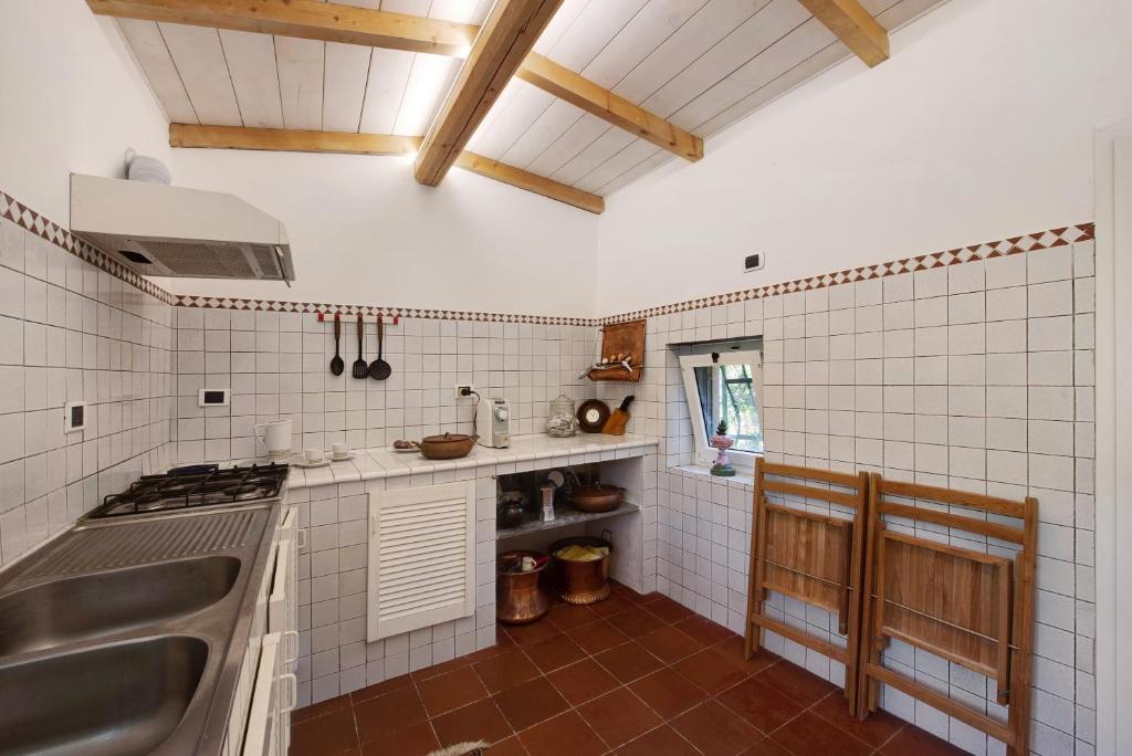 Kuchyň nebo kuchyňský kout v ubytování Cottage con vista mare