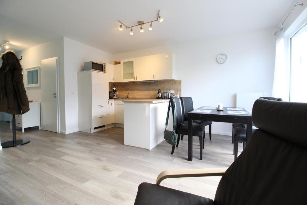 Kuchyň nebo kuchyňský kout v ubytování Kurparkcarree - Ferienwohnung Meeresbrise