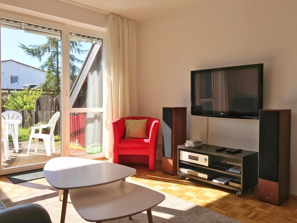 TV a/nebo společenská místnost v ubytování Ferienhaus Captain Hook