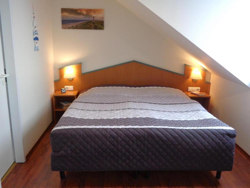 Postel nebo postele na pokoji v ubytování Hafenresidenz - Ferienwohnung 37