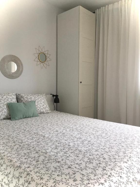Posteľ alebo postele v izbe v ubytovaní Apartament Miętowa Zebra