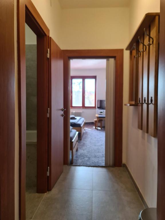 Postel nebo postele na pokoji v ubytování hotel KORUNA