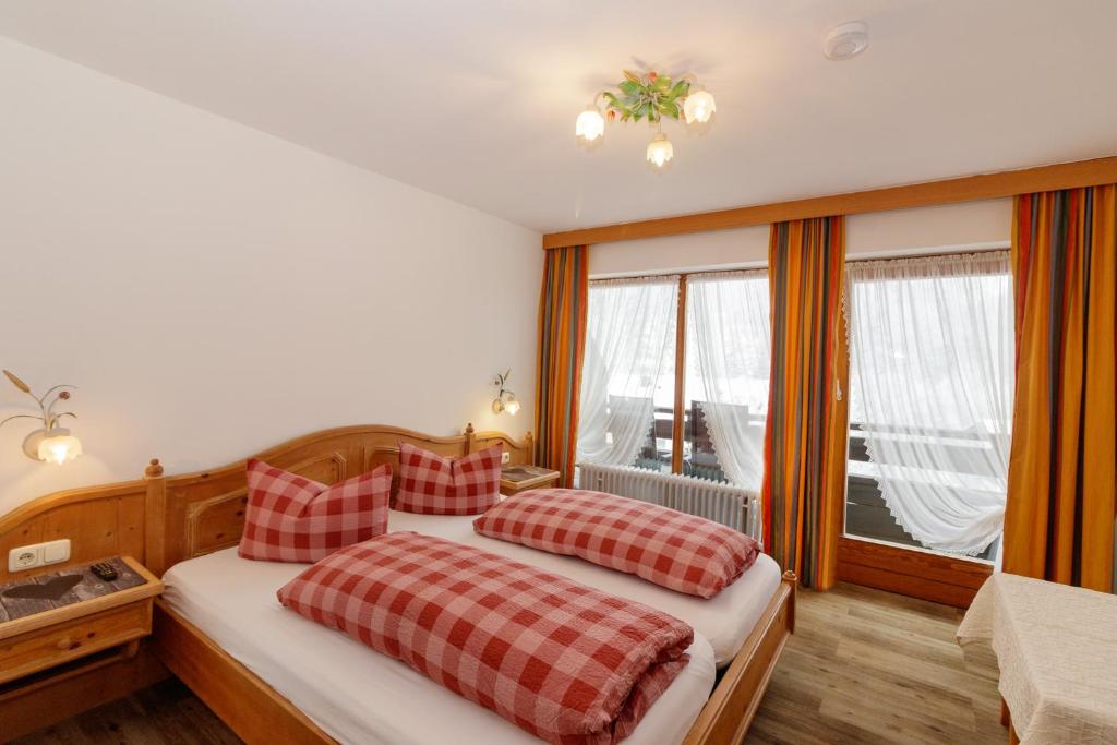 Postel nebo postele na pokoji v ubytování Hotel Binderhäusl