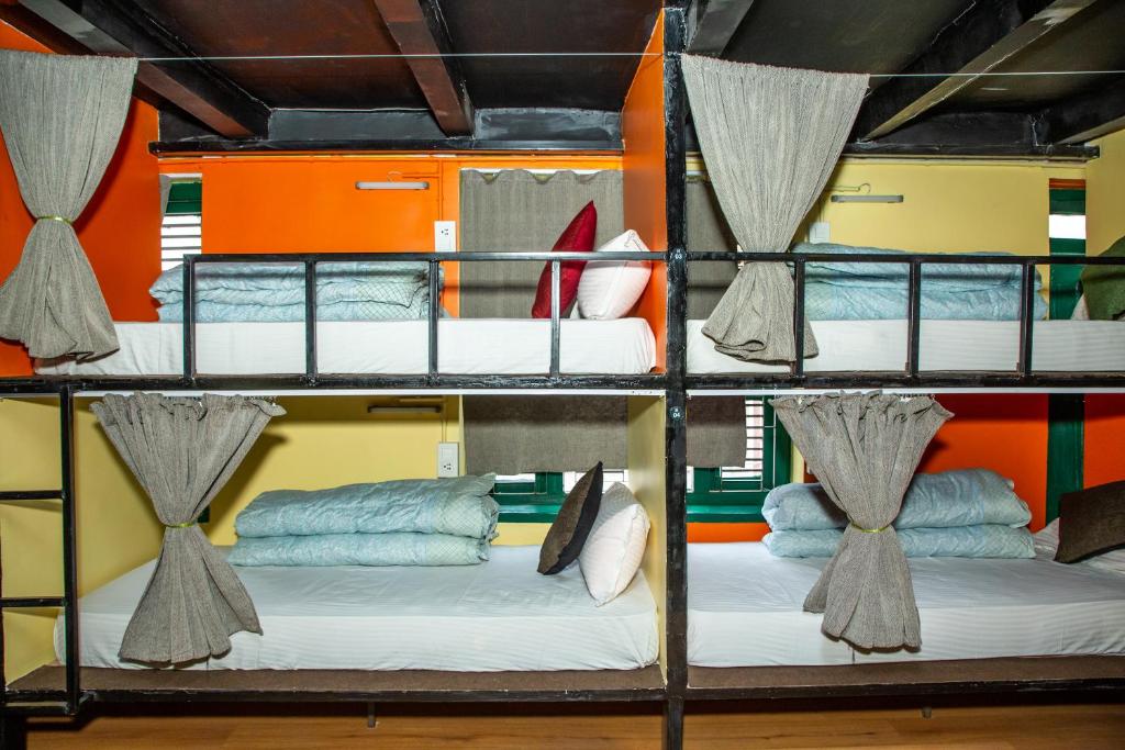 Postel nebo postele na pokoji v ubytování Trekkers Hostel