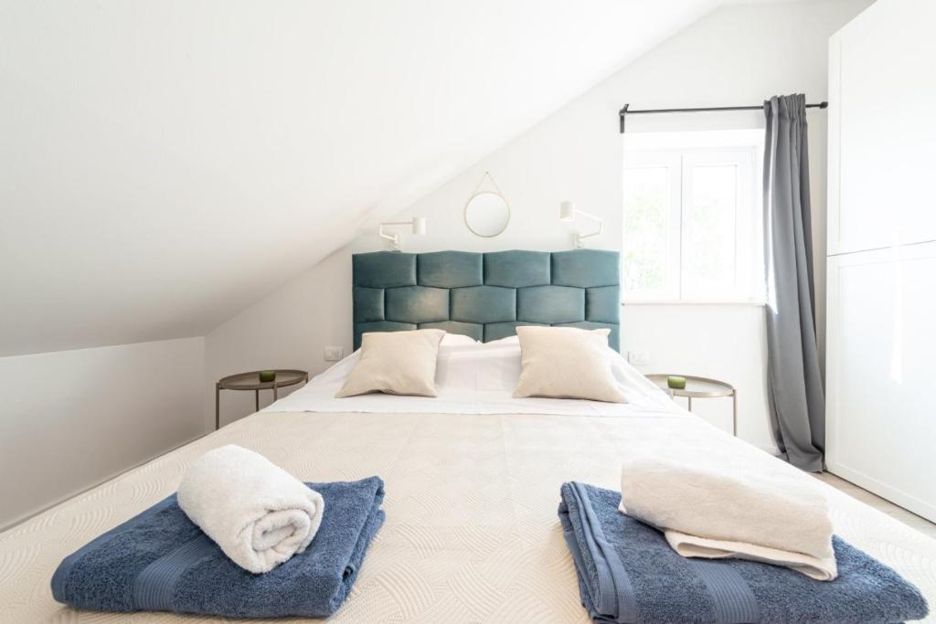 Posteľ alebo postele v izbe v ubytovaní Apartment Divine with sea view