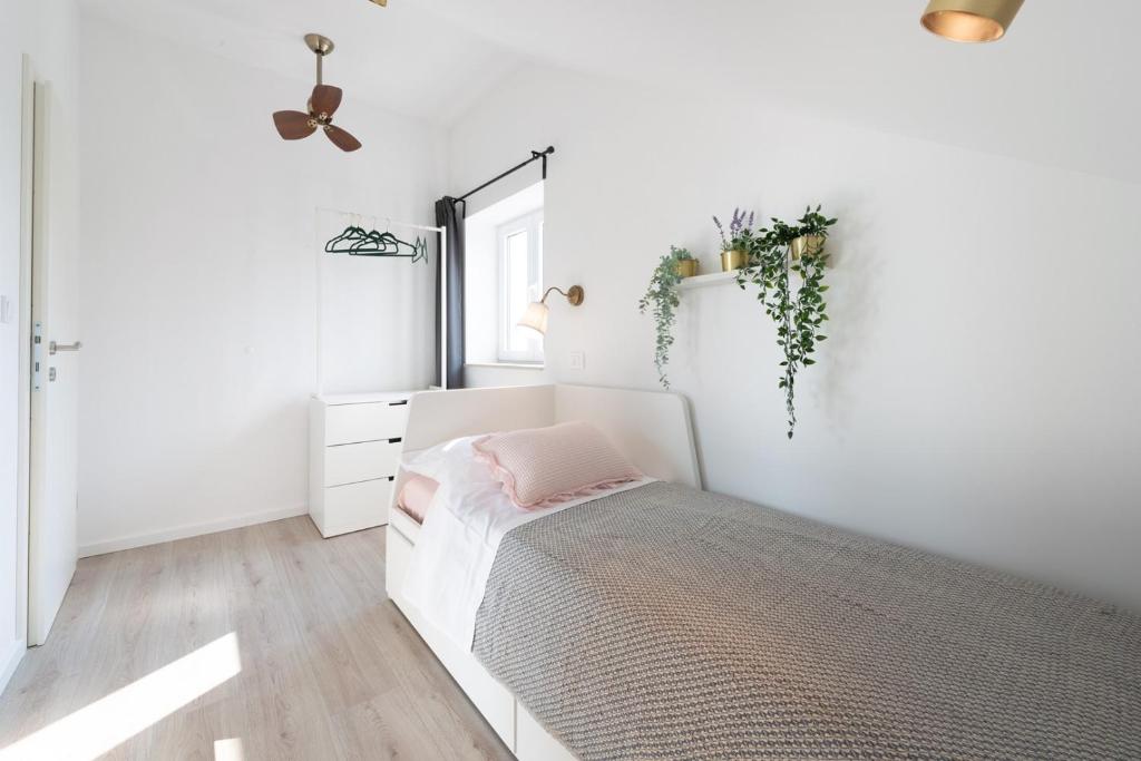 Posteľ alebo postele v izbe v ubytovaní Apartment Divine with sea view