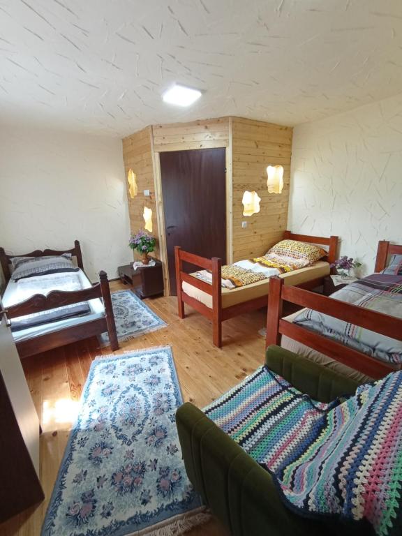 Postel nebo postele na pokoji v ubytování Konaciste Mali Izvor