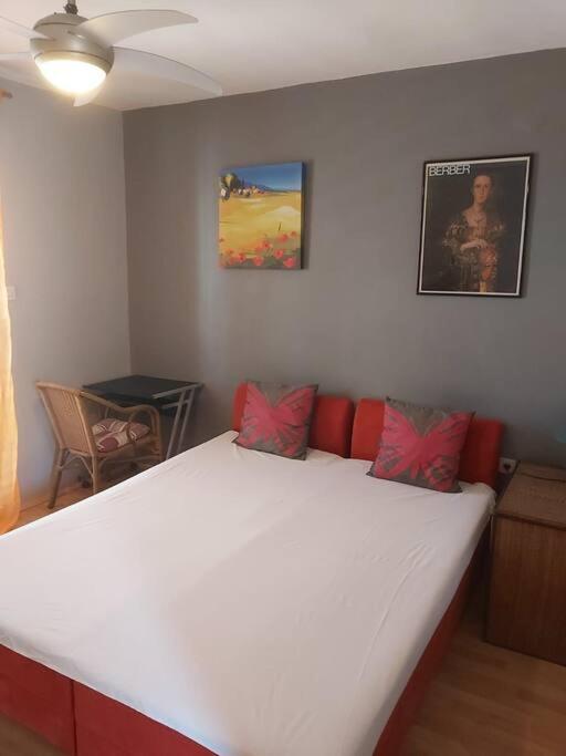 Posteľ alebo postele v izbe v ubytovaní Kia Ora Apartment