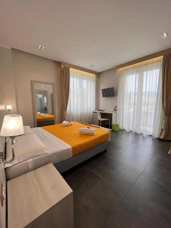 Postel nebo postele na pokoji v ubytování B&B Margherita