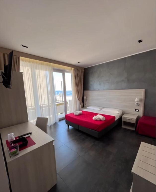 Postel nebo postele na pokoji v ubytování B&B Margherita