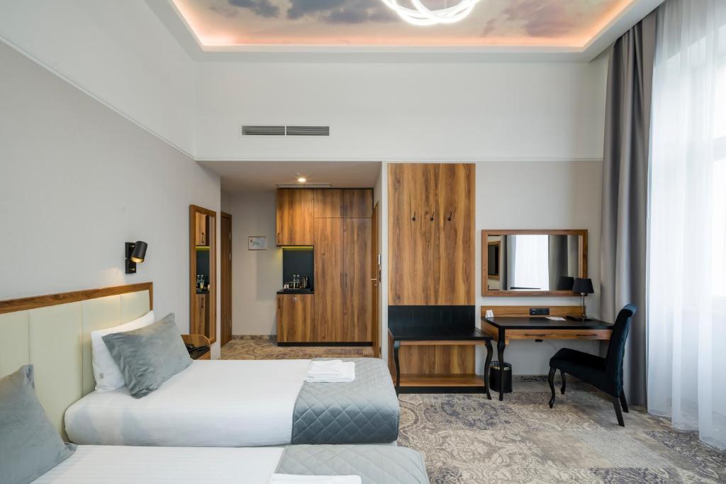 Posteľ alebo postele v izbe v ubytovaní Sky Hotel Kraków