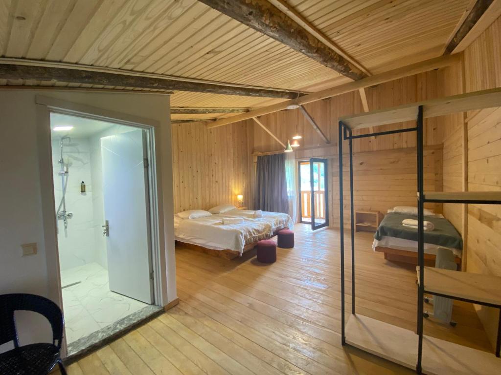 Postel nebo postele na pokoji v ubytování Hotel Chubezeni