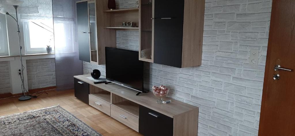 TV a/nebo společenská místnost v ubytování Ferienwohnung Gutowski