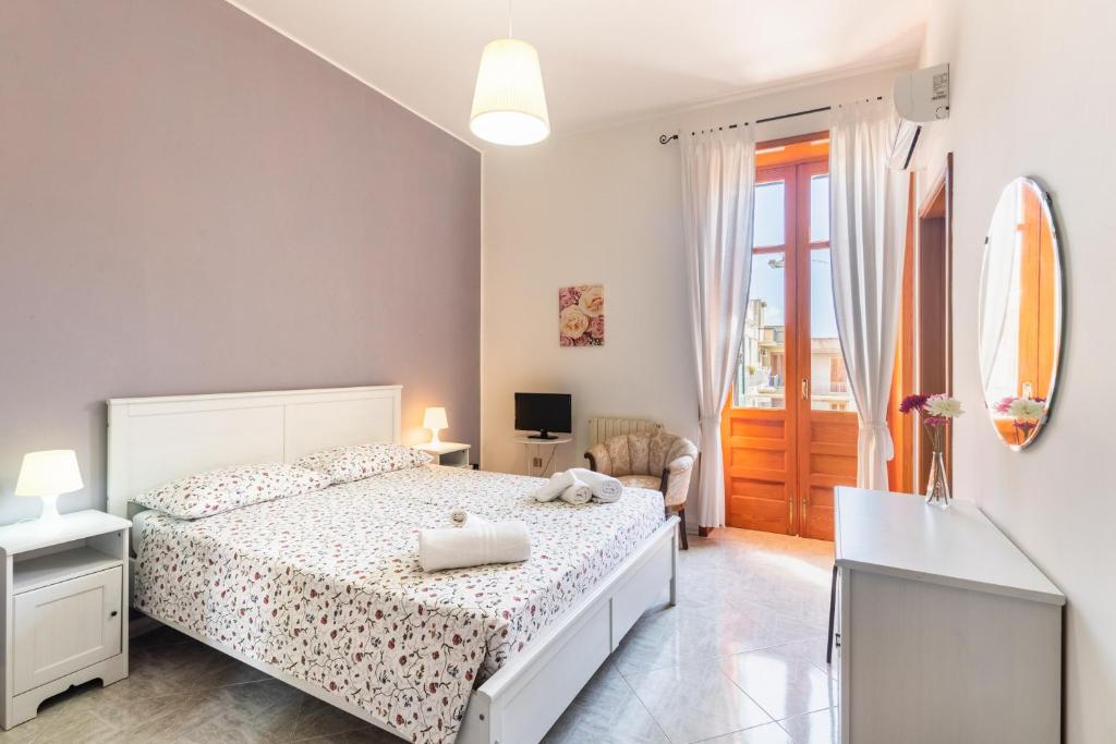 Una cama o camas en una habitación de Casa Mia