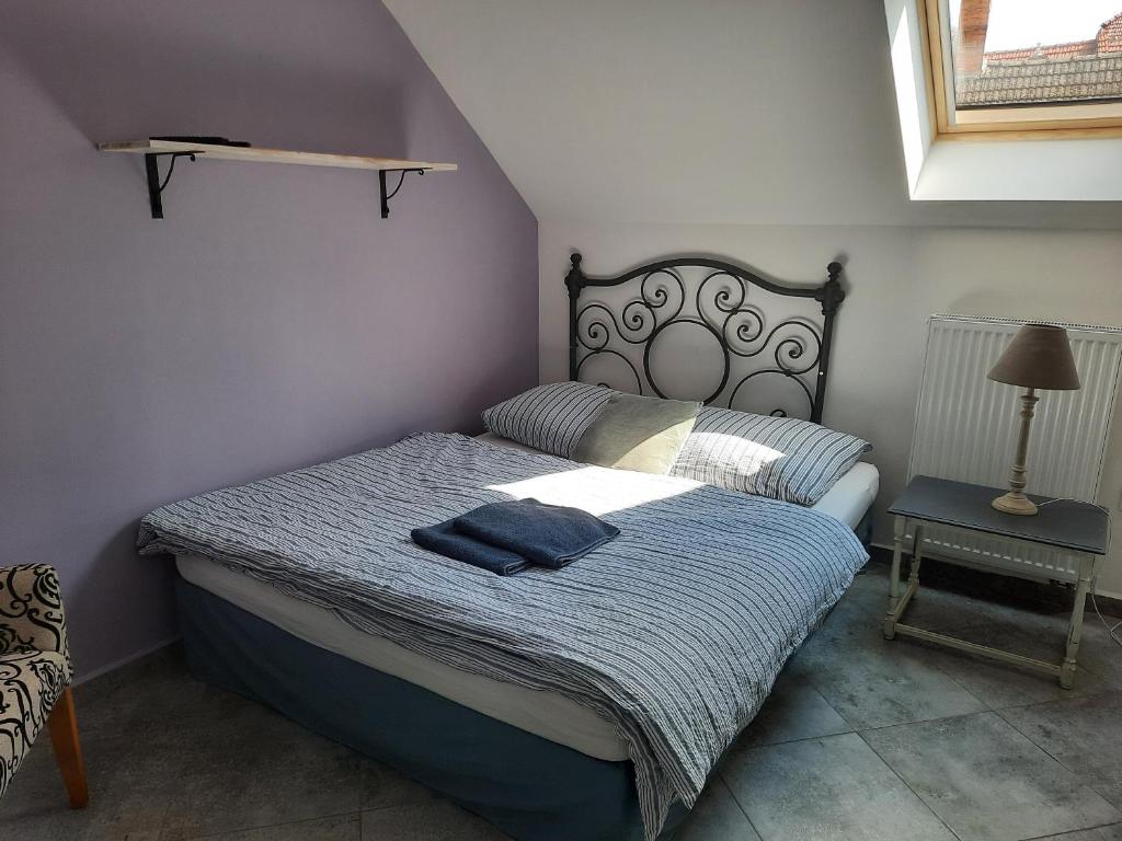 Postel nebo postele na pokoji v ubytování Statek u kapličky