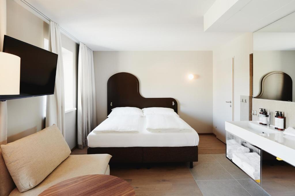 Ein Bett oder Betten in einem Zimmer der Unterkunft Boutique Hotel das Salz