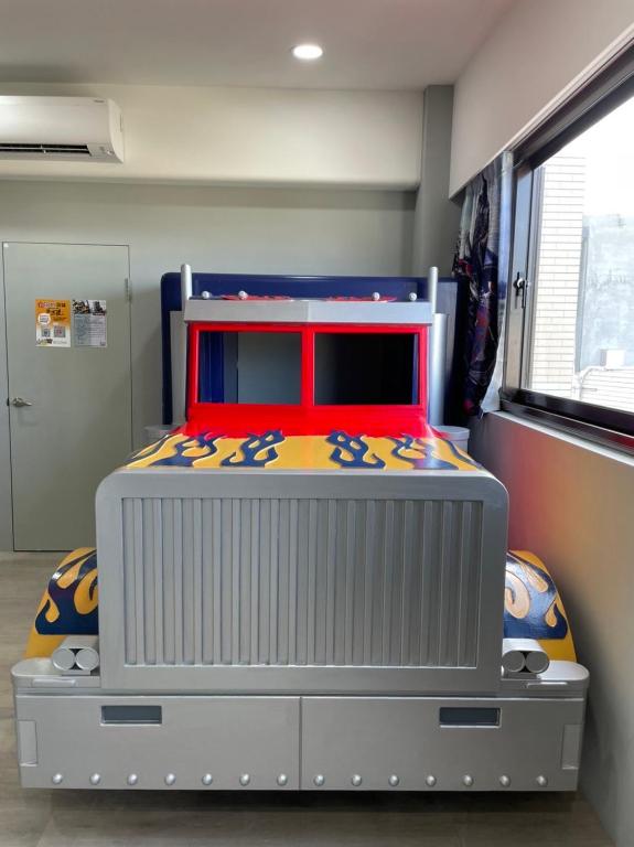 Postel nebo postele na pokoji v ubytování Kids Fun B&B