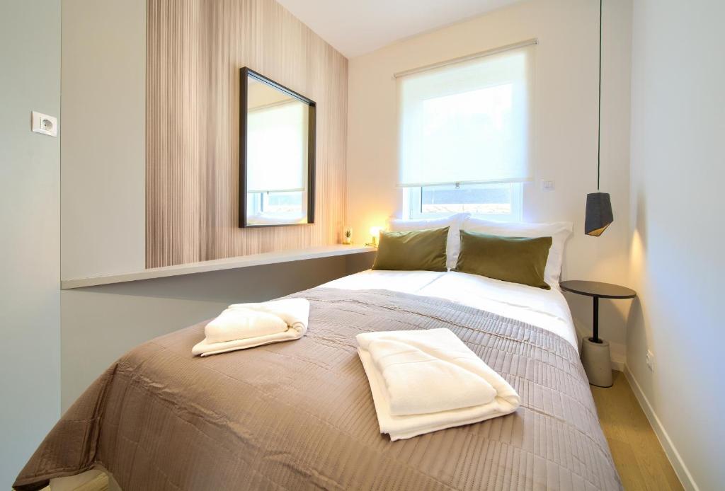 Posteľ alebo postele v izbe v ubytovaní Apartment DIAMAR with seaview
