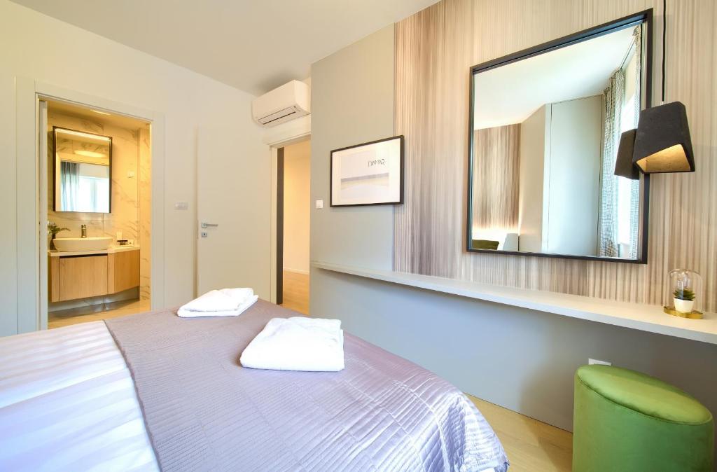 Posteľ alebo postele v izbe v ubytovaní Apartment DIAMAR with seaview