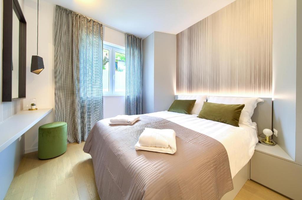 Posteľ alebo postele v izbe v ubytovaní Apartment DIAMAR with seaview