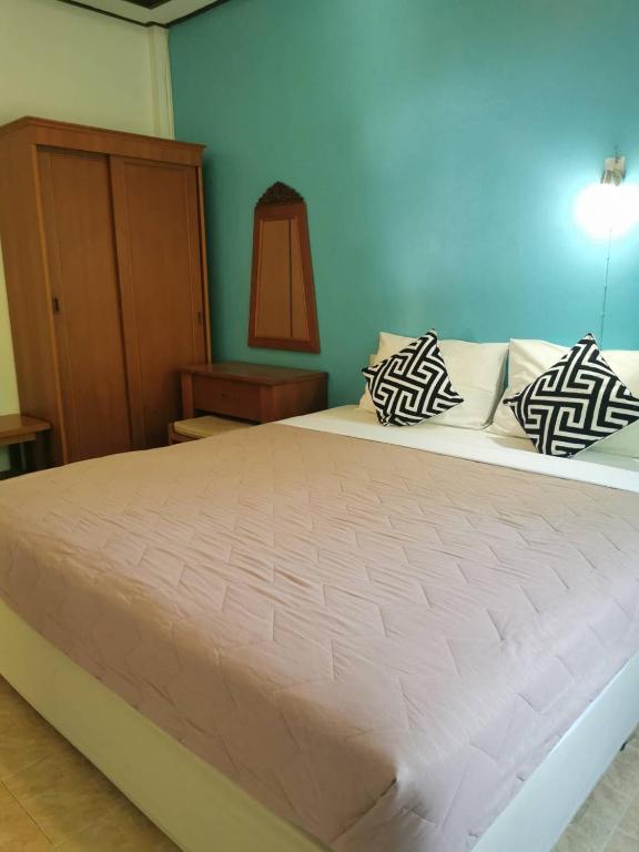 Postel nebo postele na pokoji v ubytování Phalarn Inn Resort