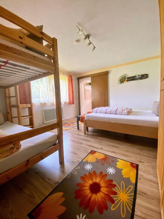 Postel nebo postele na pokoji v ubytování Haus Moosbrugger