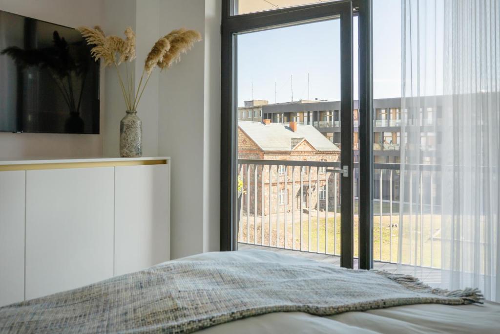 Ένα ή περισσότερα κρεβάτια σε δωμάτιο στο Liine apartment 3008