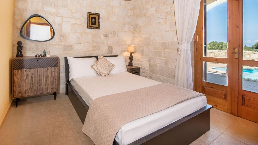 Postel nebo postele na pokoji v ubytování World Villa