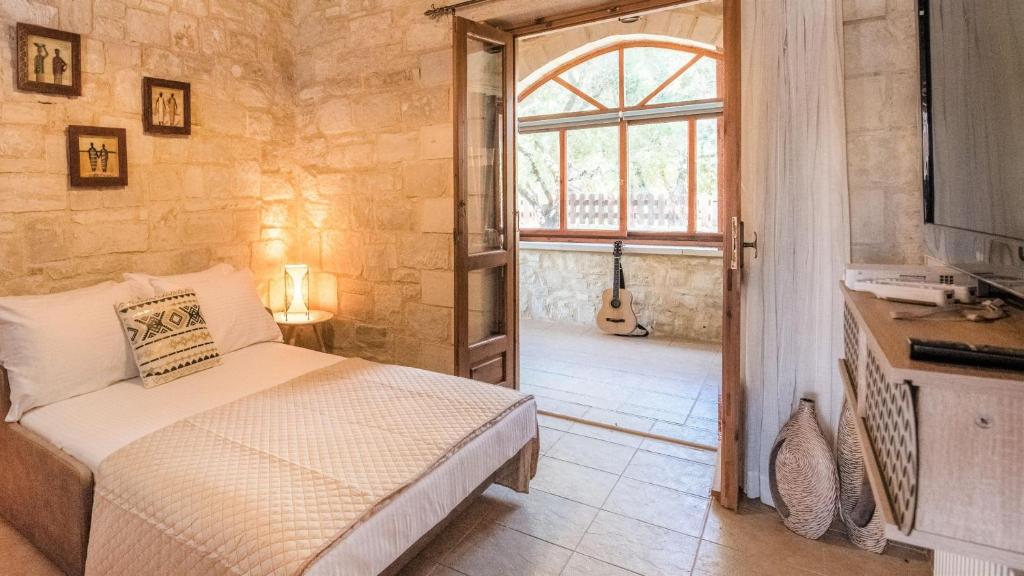 Postel nebo postele na pokoji v ubytování World Villa