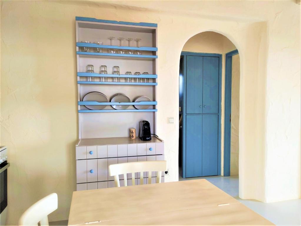 Kuchyň nebo kuchyňský kout v ubytování Mosaic Suites