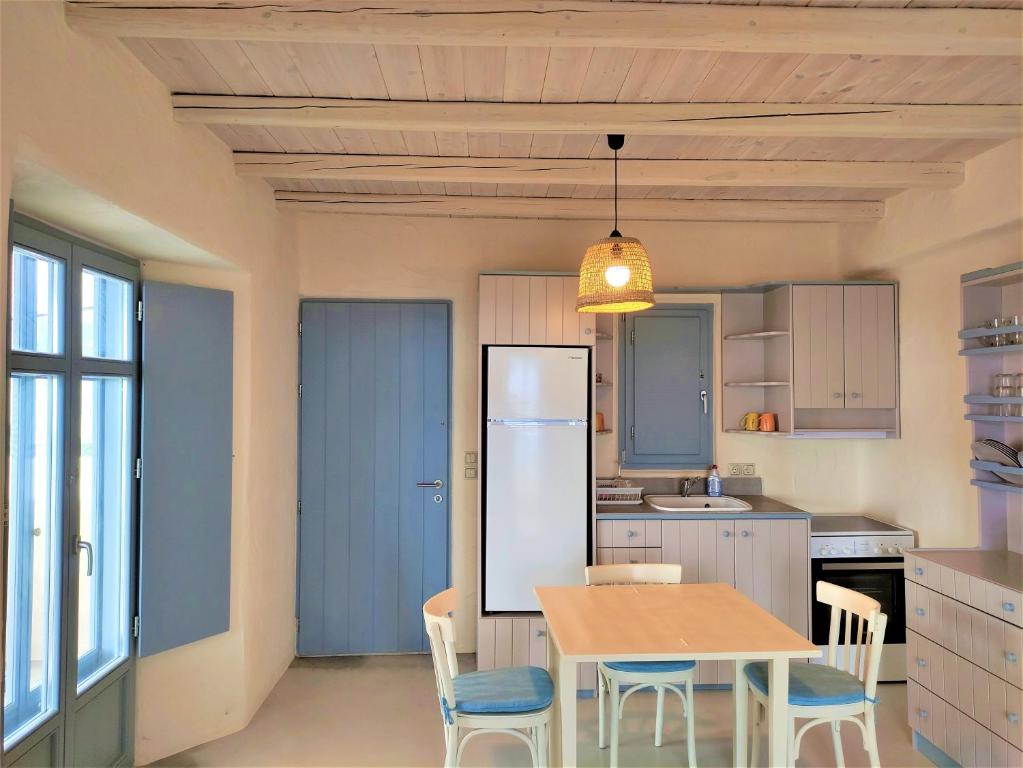 Kuchyň nebo kuchyňský kout v ubytování Mosaic Suites