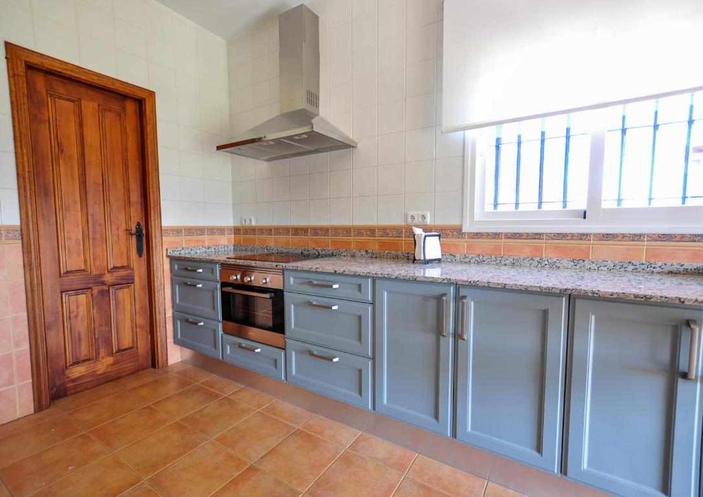 Kuchyň nebo kuchyňský kout v ubytování Paredones Casa Rural Caminito del Rey