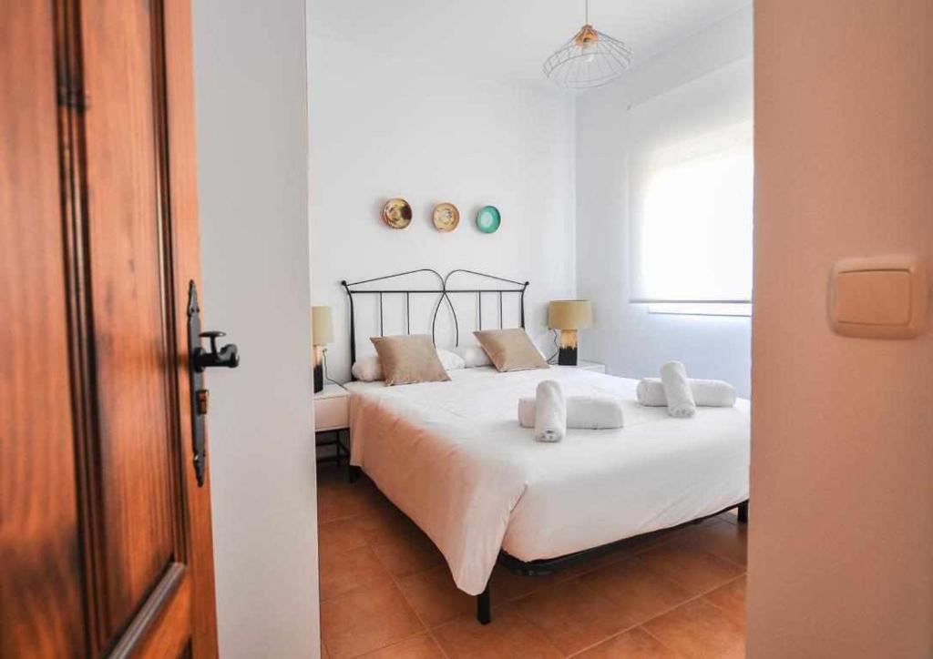 Postel nebo postele na pokoji v ubytování Paredones Casa Rural Caminito del Rey