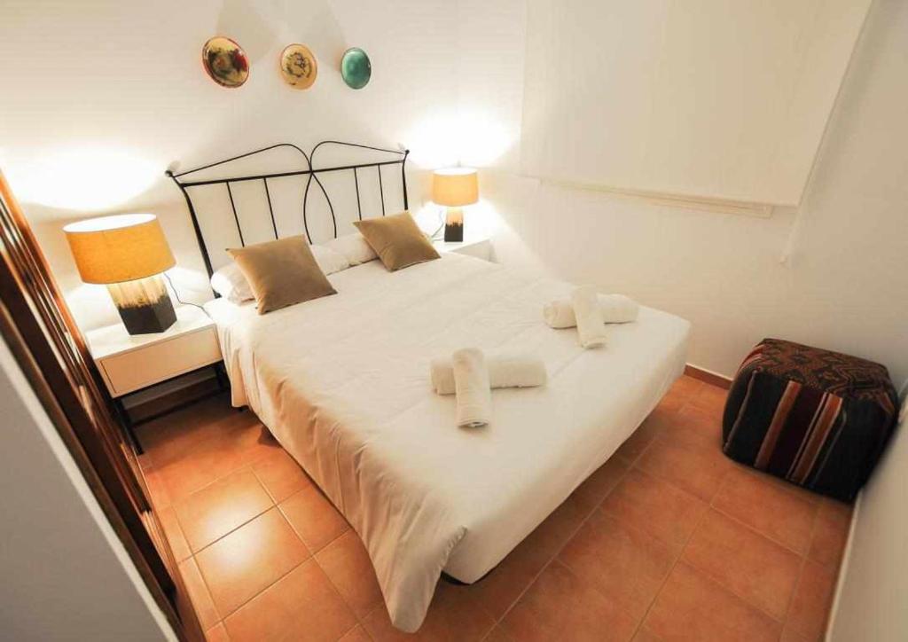 Postel nebo postele na pokoji v ubytování Paredones Casa Rural Caminito del Rey