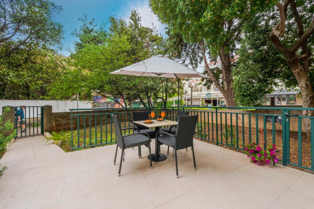 Vonkajšia záhrada v ubytovaní Apartment Promenade
