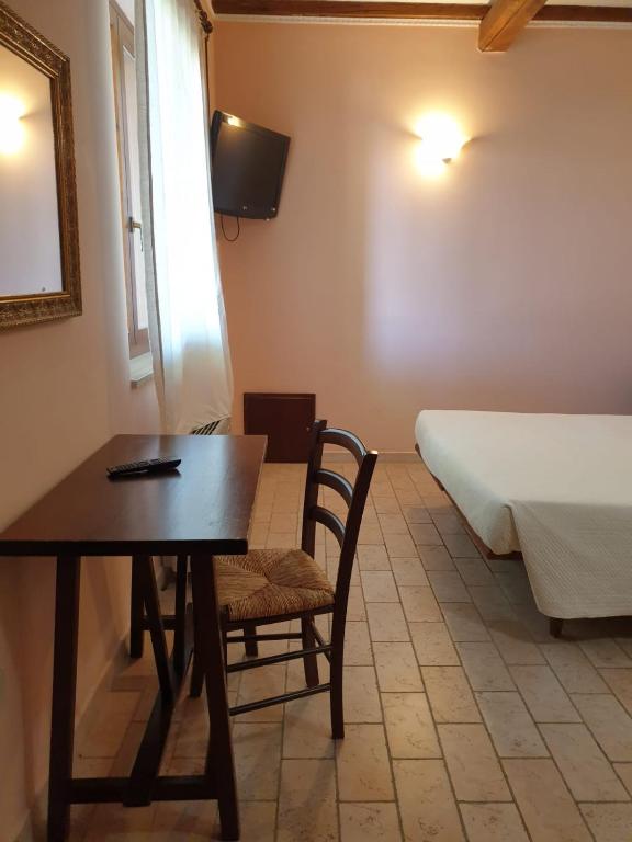 TV a/nebo společenská místnost v ubytování Agriturismo Le Querce