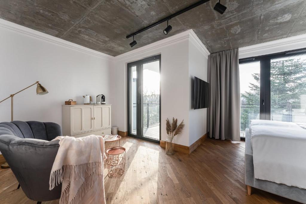 Posteľ alebo postele v izbe v ubytovaní Apartamenty Przystanek Przy Klifie