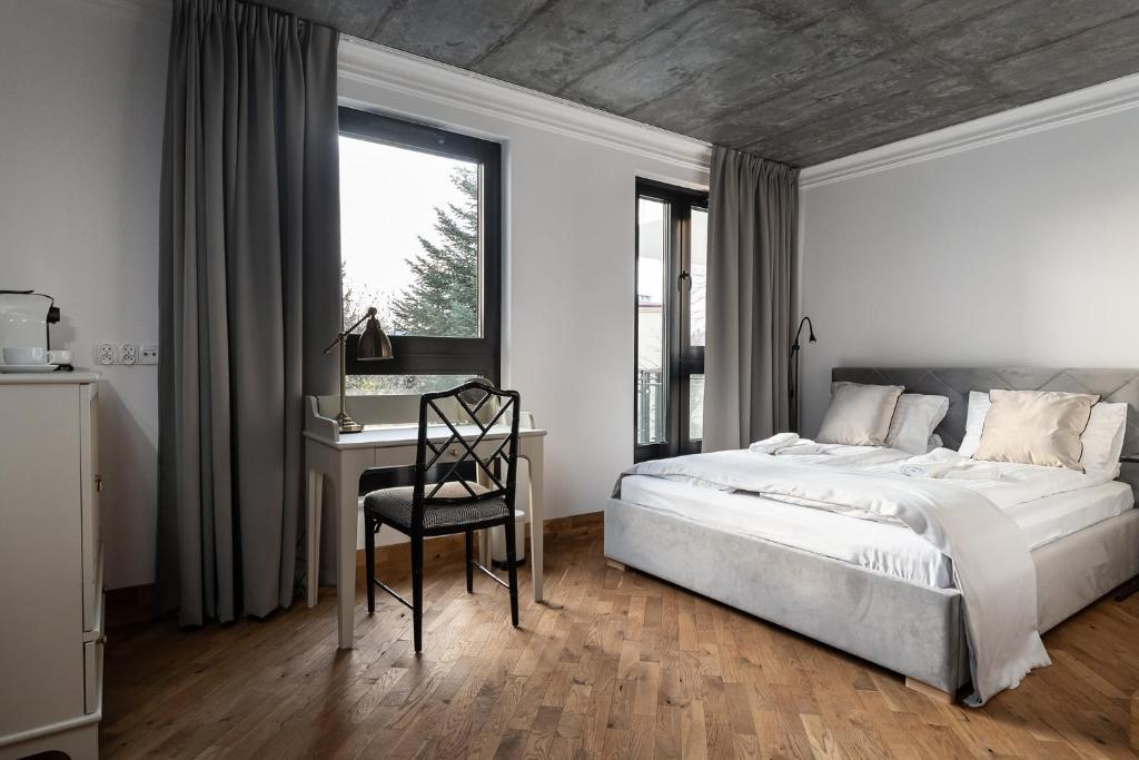 Posteľ alebo postele v izbe v ubytovaní Apartamenty Przystanek Przy Klifie