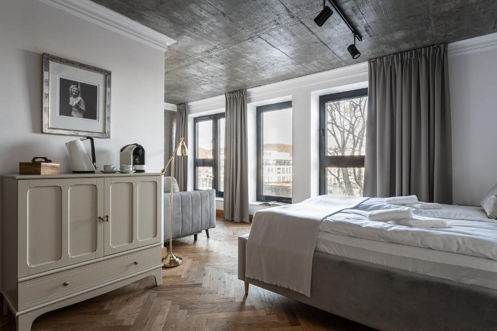 Posteľ alebo postele v izbe v ubytovaní Apartamenty Przystanek Przy Klifie