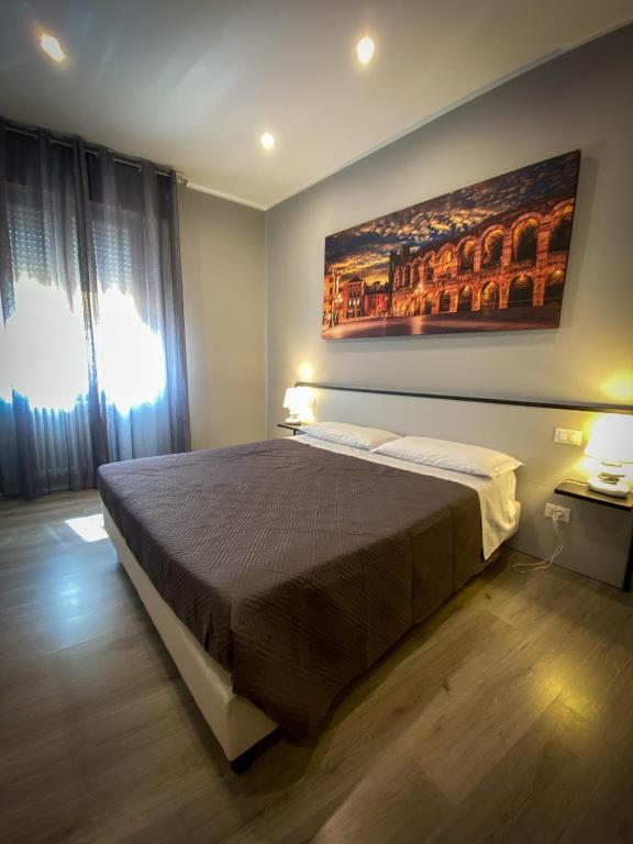 Postel nebo postele na pokoji v ubytování Hotel Arena