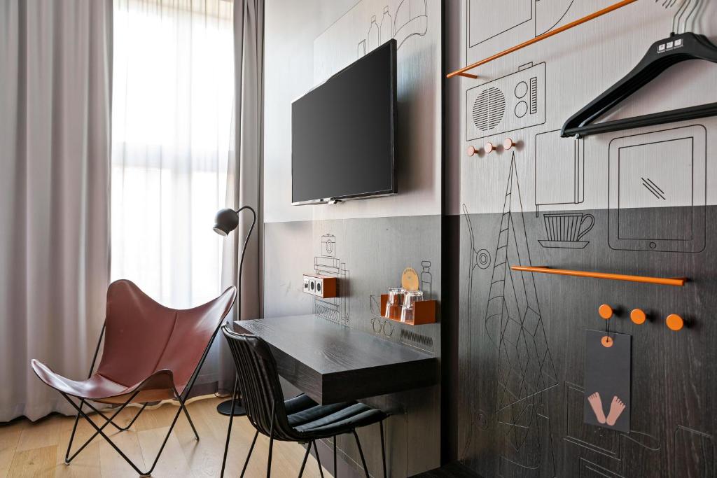 TV a/nebo společenská místnost v ubytování Comfort Hotel Karl Johan