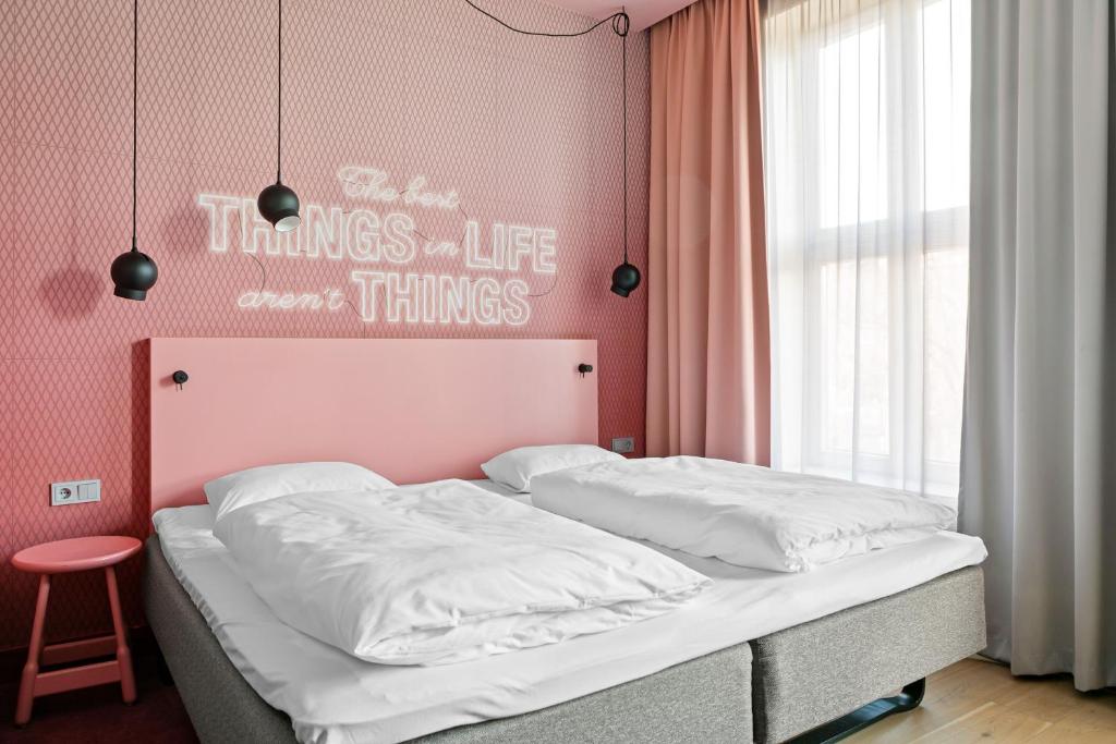 Postel nebo postele na pokoji v ubytování Comfort Hotel Karl Johan
